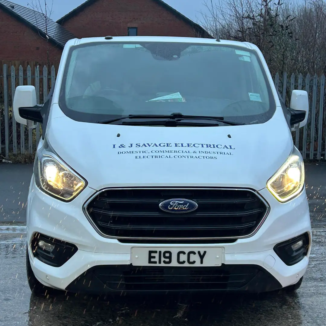 Electrician installing exterior lighting for home extension in Accrington